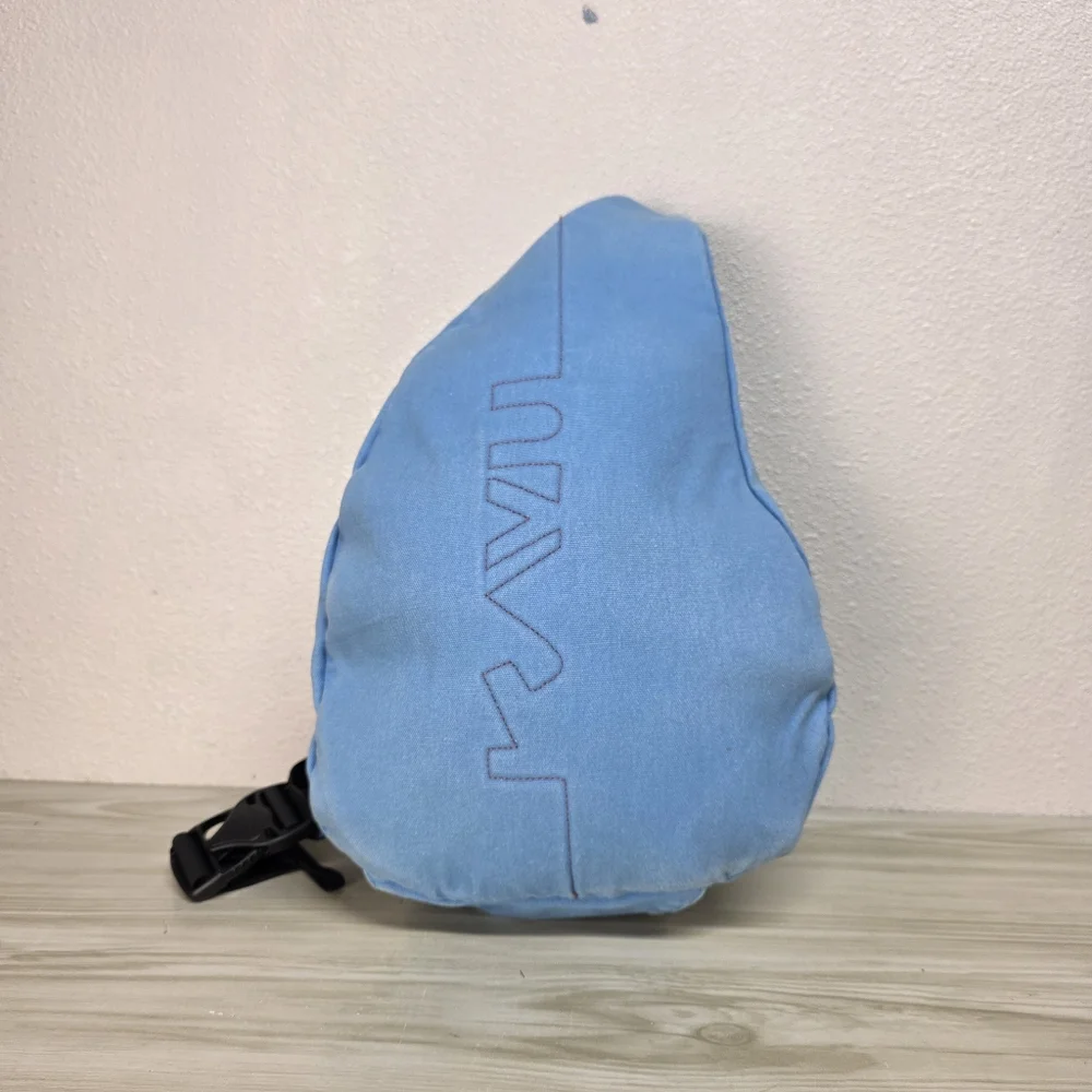 KAVU Denim Blue Sling Backpack with Orange Accents, Adjustable Rope Strap